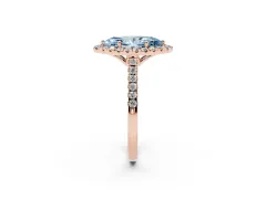 Fancy Blue Marquise Cut Diamond Pavé Halo Engagement Ring Set in Rose gold with Pavé Band and Prong Setting