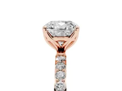 Cushion Cut Diamond Solitaire Engagement Ring Set in Rose gold with Round Pavé Band and Prong Setting