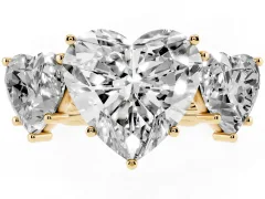 Heart Cut Diamond Three-Stone Ring Set in Yellow gold with Braided Band