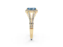 Fancy Blue Emerald Cut Diamond Halo Split Shank Pavé Ring Set in Yellow gold with Prong Setting