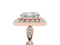 Radiant Cut Diamond Halo Engagement Ring Set in Rose gold with Twisted Band and Prong Setting