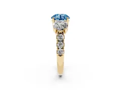 Fancy Blue Round Cut Diamond Three-Stone Ring Set in Yellow gold with Pavé Band