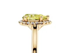 Fancy Yellow Pear Cut Diamond Halo Engagement Ring Set in Yellow gold with Pavé Band and Rising Shoulders