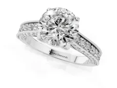 Round Cut Diamond Solitaire Ring Set in Platinum with Milgrain-Edged Pavé Band and Prong Setting
