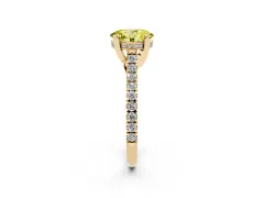 Fancy Yellow Oval Cut Diamond Solitaire Ring Set in Yellow gold with Brilliant Pavé Band and Prong Setting