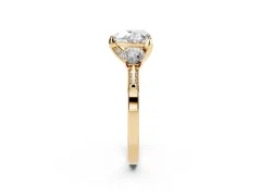 Heart Cut Diamond Three-Stone Ring Set in Yellow gold with Pavé Band and Smaller Side Stones