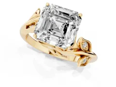 Asscher Cut Diamond Solitaire Twist Engagement Ring Set in Yellow gold with Pavé Leaf Accents