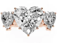 Heart Cut Diamond Three-Stone Ring Set in Rose gold with Braided Band