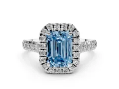 Fancy Blue Emerald Cut Diamond Halo Engagement Ring Set in Silver with Pavé Band and Prong-Set Center