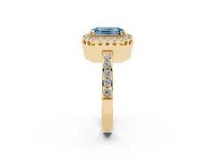 Fancy Blue Emerald Cut Diamond Halo Ring Set in Yellow gold with Pavé Shank and Prong Setting