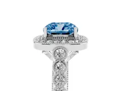 Fancy Blue Cushion Cut Diamond Milgrain Halo Solitaire Ring Set in Platinum with Bezel Set Side Stones and Pavé Band