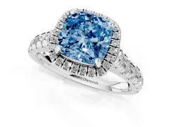 Fancy Blue Cushion Cut Diamond Halo Engagement Ring Set in Platinum with Pavé Band and Prong-Set Center