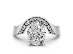Oval Cut Diamond Solitaire Engagement Ring Set in Platinum with Pavé Shoulders