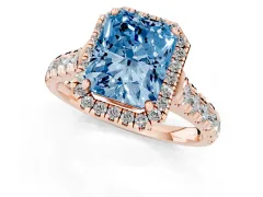 Fancy Blue Radiant Cut Diamond Halo Engagement Ring Set in Rose gold with Pavé Band and Prong-Set Center