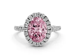 Fancy Pink Oval Cut Diamond Pavé Halo Engagement Ring Set in White gold with Pavé Band and Prong Setting