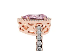 Fancy Pink Pear Cut Diamond Halo Ring Set in Rose gold with Pavé Shoulders and Halo-Framed Center