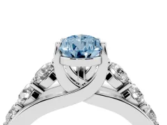 Fancy Blue Pear Cut Diamond Pavé Engagement Ring Set in Platinum with Prong Setting