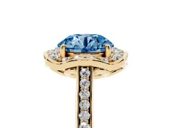 Fancy Blue Round Cut Diamond Halo Ring Set in Yellow gold with Pavé-Lined Shoulders and Prong Setting