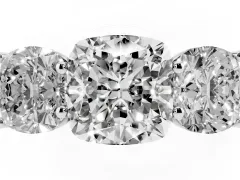 Cushion Cut Diamond Three-Stone Ring Set in Platinum with Plain Polished Band