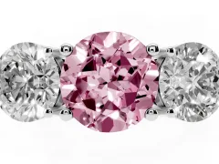 Fancy Pink Round Cut Diamond Three-Stone Ring Set in Platinum with Prong Setting and Plain Band