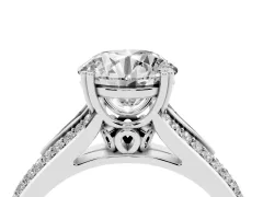 Round Cut Diamond Split Shank Pavé Engagement Ring Set in White gold with Prong-Set Center Stone