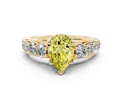 Fancy Yellow Pear Cut Diamond Pavé Engagement Ring Set in Yellow gold with Prong Setting