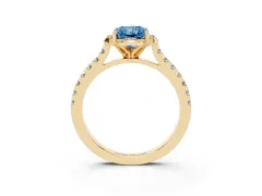 Fancy Blue Radiant Cut Diamond Solitaire Ring Set in Yellow gold with Pavé Band and Floral Prong Setting