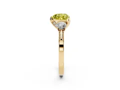 Fancy Yellow Heart Cut Diamond Three-Stone Ring Set in Yellow gold with Pavé Band and Smaller Side Stones