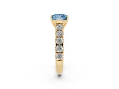 Fancy Blue Princess Cut Diamond Solitaire Ring Set in Yellow gold with Cut-Down Micro Pavé Band and Prong Setting