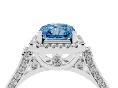 Fancy Blue Radiant Cut Diamond Halo Ring Set in Platinum with Pavé-Lined Split Shank Band