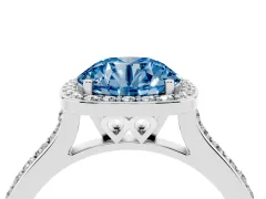 Fancy Blue Round Cut Diamond Halo Engagement Ring Set in Platinum with Round Pavé Shoulders and Heart Gallery