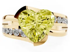 Fancy Yellow Heart Cut Diamond Solitaire Ring Set in Yellow gold with Channel Set Split Shank and Tension Prongs