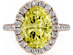 Fancy Yellow Oval Cut Diamond Halo Pavé Engagement Ring Set in Rose gold with Prong Setting