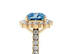 Fancy Blue Cushion Cut Diamond Halo Ring Set in Yellow gold with Pavé Band and Prong Setting