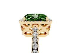 Fancy Green Radiant Cut Diamond Halo Ring Set in Yellow gold with Pavé Shoulders and Halo-Framed Center