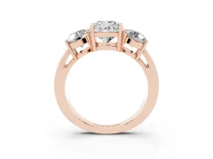 Cushion Cut Diamond Three-Stone Ring Set in Rose gold with Round Side Stones and Classic Band