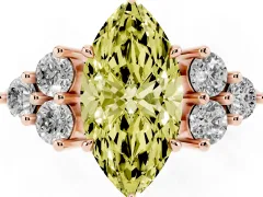 Fancy Yellow Marquise Cut Diamond Solitaire Ring Set in Rose gold with Cluster Accents on Each Side