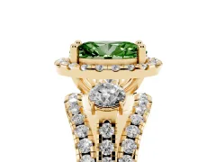 Fancy Green Oval Cut Diamond Halo Split Shank Ring Set in Yellow gold with Round Accent Stones and Prong Setting