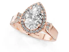 Pear Cut Diamond Halo Ring Set in Rose gold with Pavé-Lined Split Shank Band