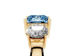 Fancy Blue Princess Cut Diamond Three-Stone Ring Set in Yellow gold with Round Side Stones and Classic Band