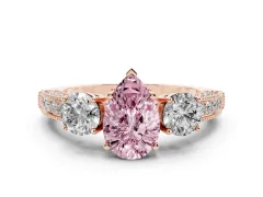 Fancy Pink Pear Cut Diamond Three-Stone Ring Set in Rose gold with Round Side Stones and Pavé Band