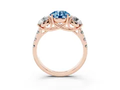 Fancy Blue Round Cut Diamond Three-Stone Ring Set in Rose gold with Pavé Band