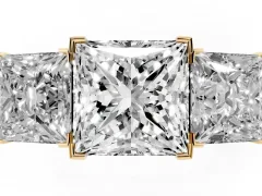 Princess Cut Diamond Three-Stone Ring Set in Yellow gold with Channel-Set Band and Prong Settings