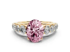 Fancy Pink Oval Cut Diamond Solitaire Ring Set in Yellow gold with Pavé-Set Band and Prong Setting
