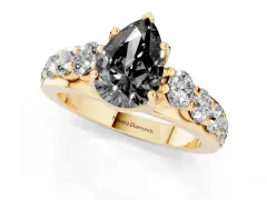 Fancy Black Pear Cut Diamond Pavé Engagement Ring Set in Yellow gold with Prong Setting