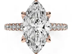 Marquise Cut Diamond Solitaire Ring Set in Rose gold with Brilliant Pavé Band and Prong Setting