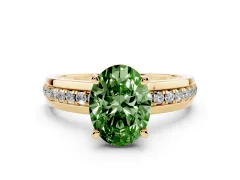 Fancy Green Oval Cut Diamond Solitaire Ring Set in Yellow gold with Channel Set Band and Prong Setting
