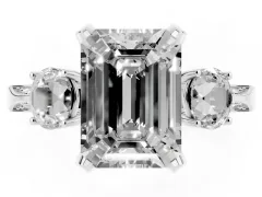 Emerald Cut Diamond Three-Stone Ring Set in Platinum with Pavé Band and Smaller Side Stones