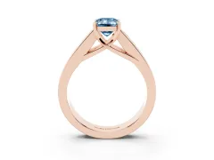 Fancy Blue Emerald Cut Diamond Solitaire Ring Set in Rose gold with Channel-Set Accent Stones and Prong Setting