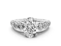 Oval Cut Diamond Solitaire Ring Set in Silver with Pavé-Set Band and Prong Setting